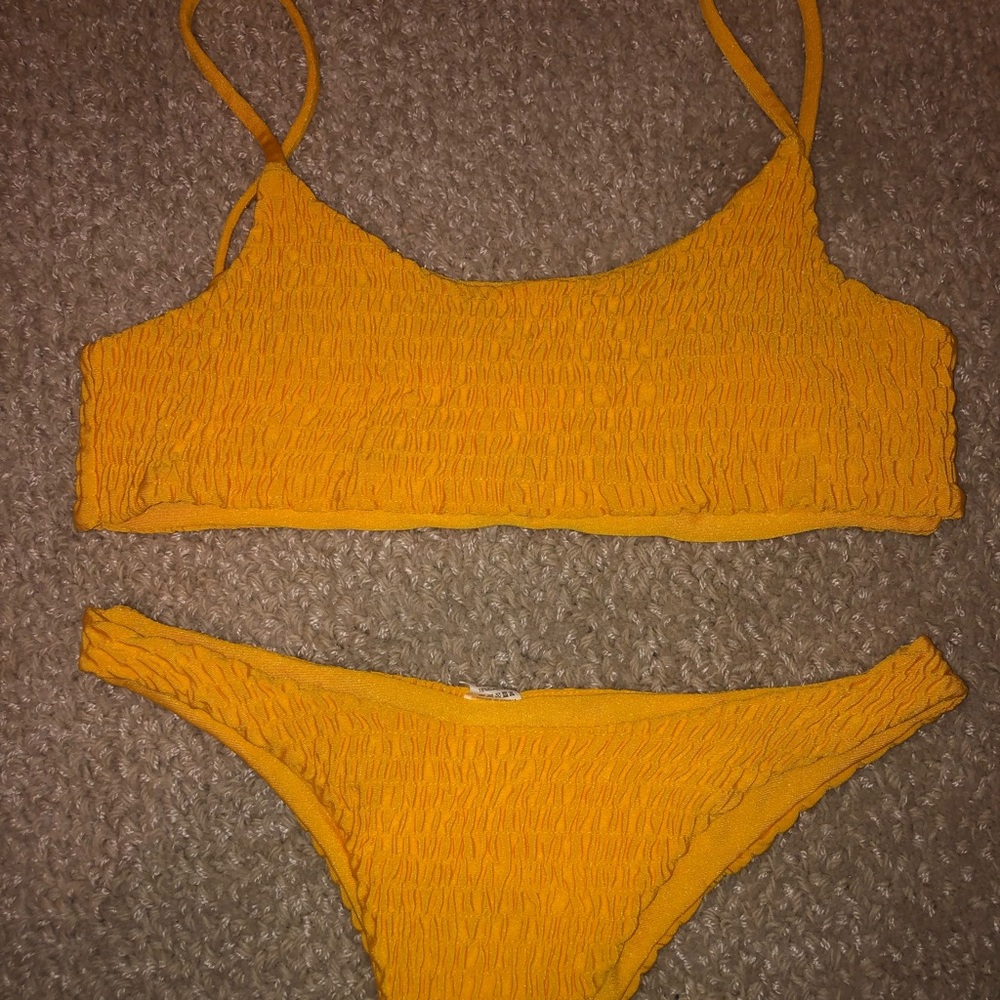 Super cute yellow swim suit never worn